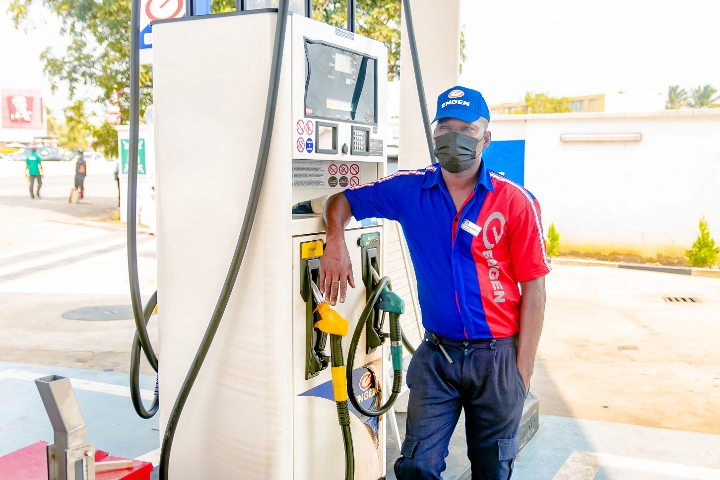 man filling car
